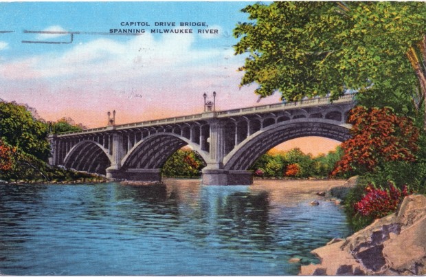 Spanning 532 feet and requiring more than 20,000 tons of concrete, the former Capitol Drive bridge over the Milwaukee River was an imposing structure. The bridge was built in 1927. This postcard was mailed in 1946. Carl Swanson collection